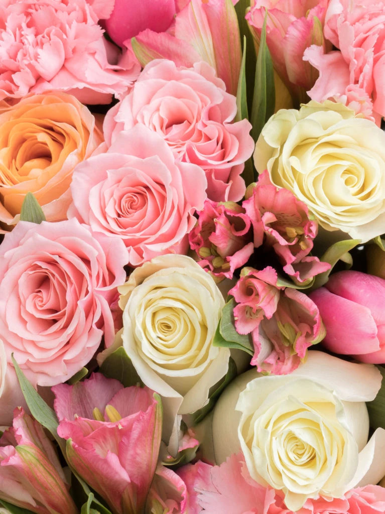 Aveline Bouquet with pink, peach, and coral roses, carnations, tulips, alstroemeria, and eucalyptus arranged for flower delivery in Chandler, Arizona