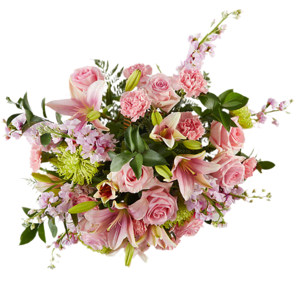 A bouquet of flowers including pink carnations, green stock, pink roses, white lilies, and purple Fuji mums, arranged in a wooden basket.