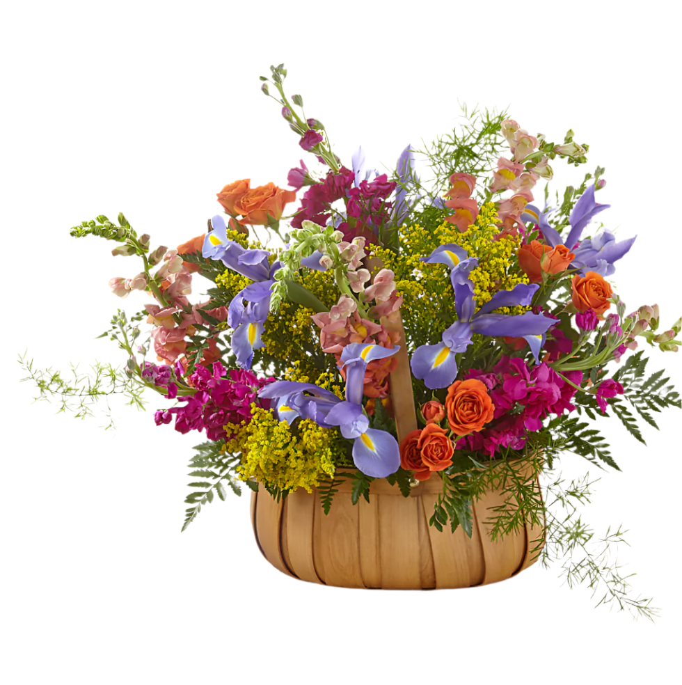 A colorful floral arrangement featuring a variety of flowers including purple flowers, orange flowers, and green foliage, arranged in a wooden basket.