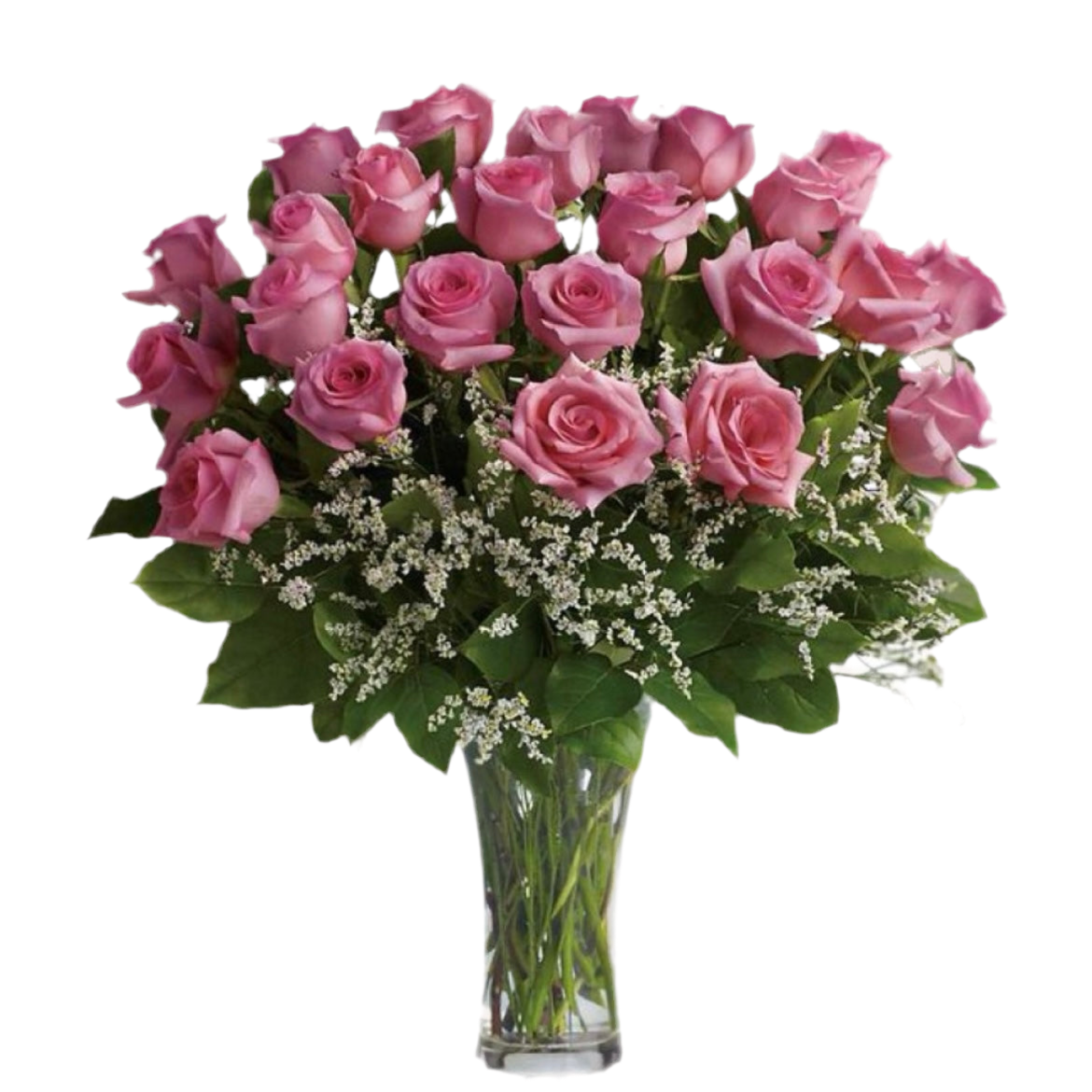 A clear glass vase containing a dozen pink roses with green leaves and decorative foliage.